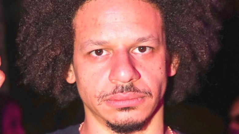 Eric André looking into camera