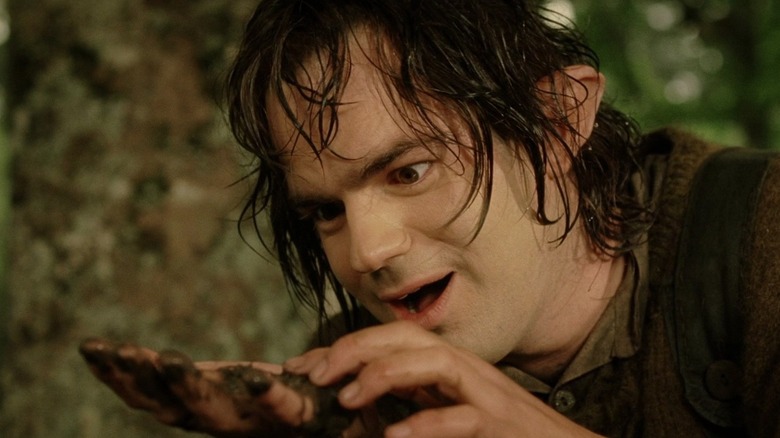 Déagol looks at the Ring in his hand in "The Lord of the Rings: The Return of the King" (2003)