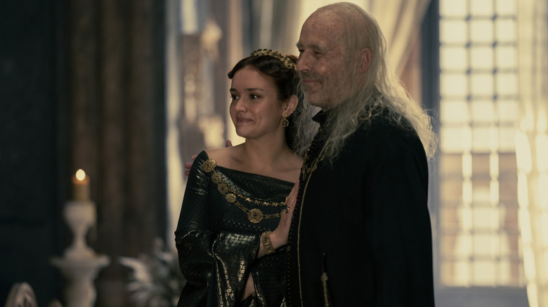 Alicent in celebratory mood with Viserys I 