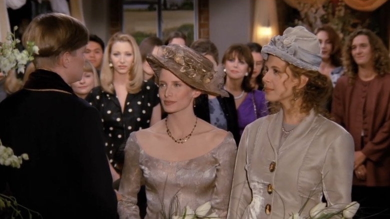 Candace Gingrich as the minister, Jane Sibbett as Carol and Jessica Hecht as Susan in Friends