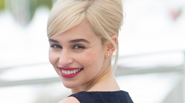 Emilia Clarke smiling at event