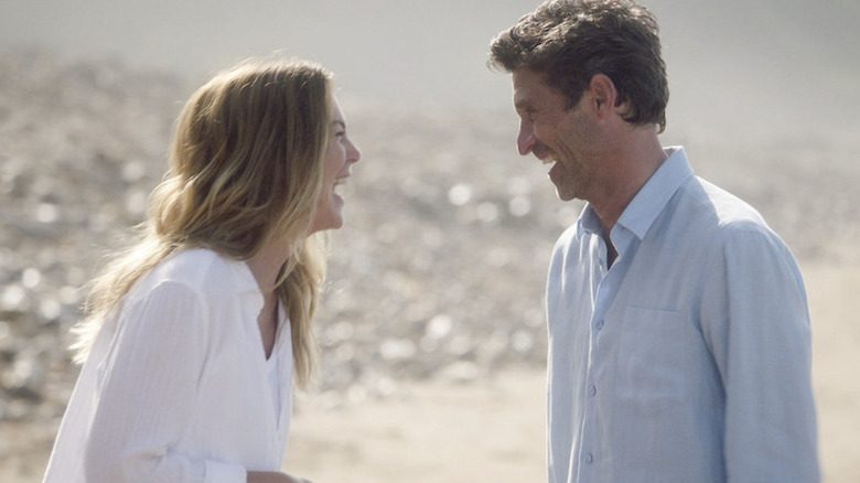 Meredith and Derek laughing