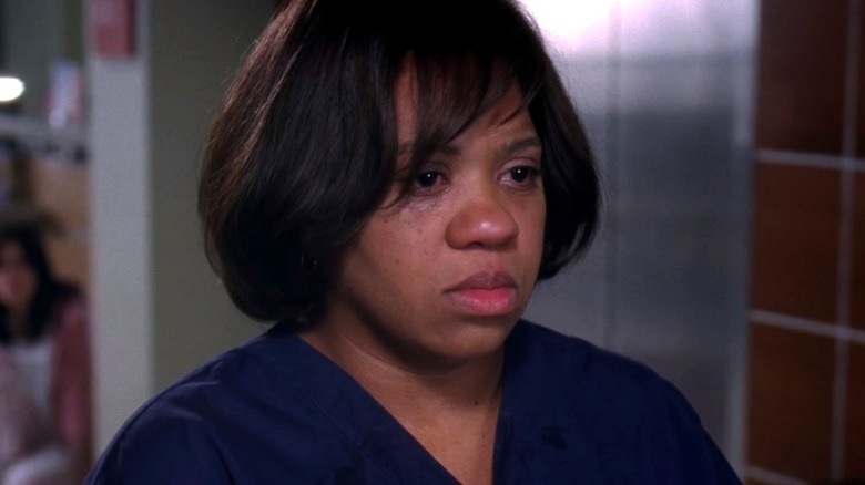 Miranda Bailey looking serious to the right