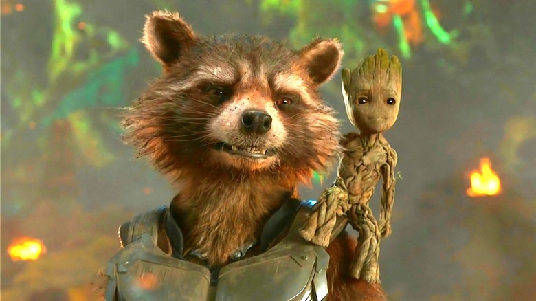 Baby Groot on Rocket's shoulder