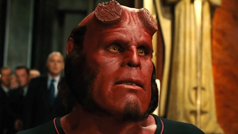 Hellboy stares in shock 