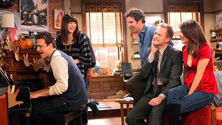 Marshall playing the piano while Lily Ted Barney and Robin listen on How I Met Your Mother