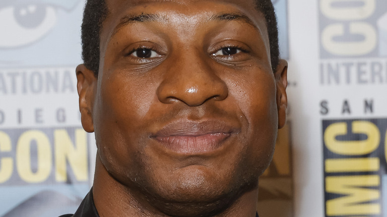 Jonathan Majors smiling