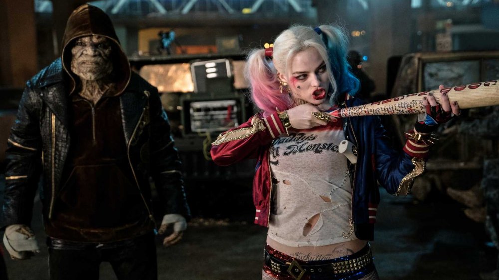 Adewale Akinnuoye-Agbaje and Margot Robbie in Suicide Squad