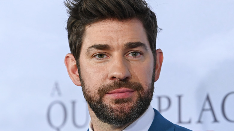 John Krasinski looking serious at event