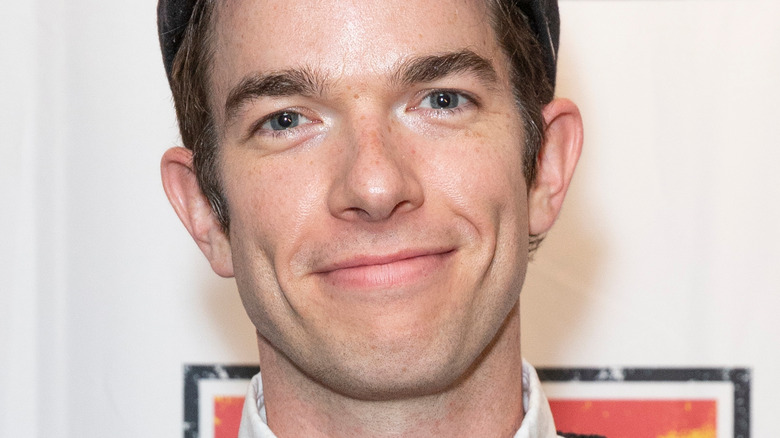 John Mulaney smiling