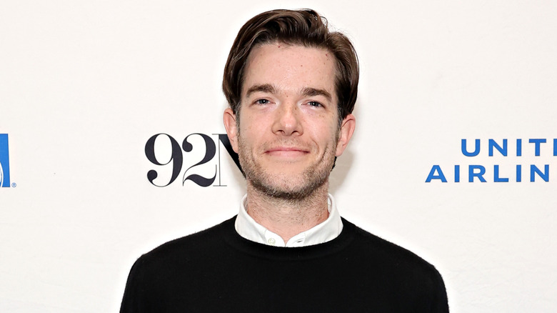 John Mulaney smiling