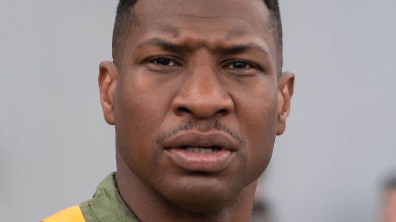 Jonathan Majors as Jesse Brown looking out to sea in Devotion