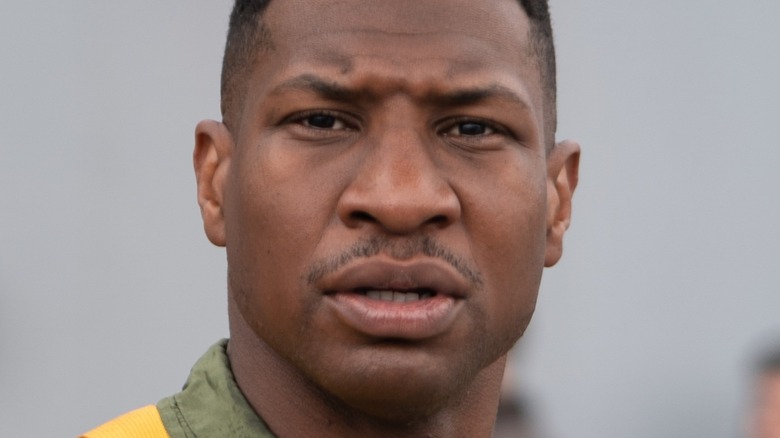 Jonathan Majors as Jesse Brown looking out to sea in Devotion