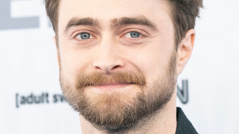 Daniel Radcliffe smiles