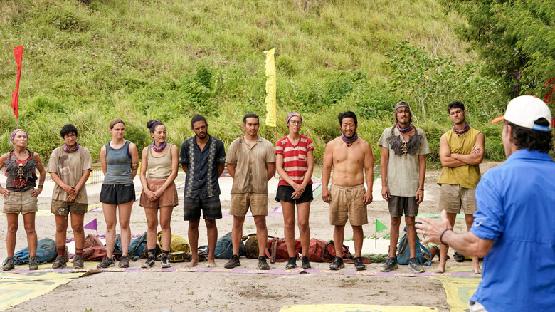 Cast of Survivor 47 looking to Jeff Probst
