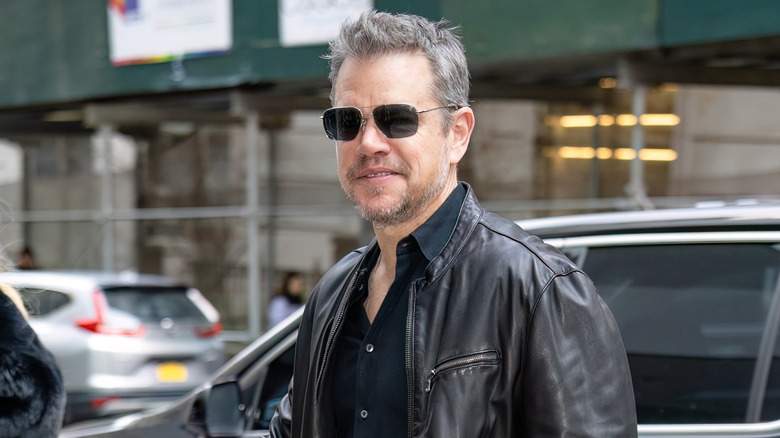 Matt Damon grinning in 2024