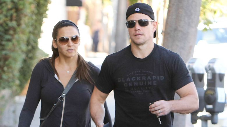Matt Damon, and Luciana Barroso Damon on their way to the gym