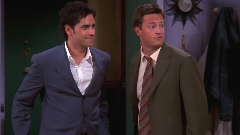 Zack and Chandler enter the apartment.