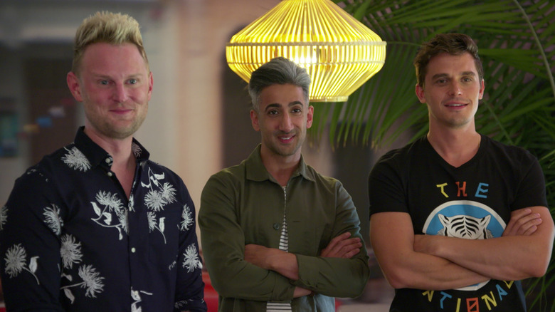 Bobby Berk, Tan France, and Antoni Porowski smiling proudly
