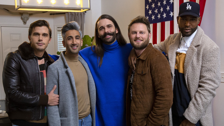 Antoni Porowski, Tan France, Jonathan Van Ness, Bobby Berk, and Karamo Brown smiling behind the scenes