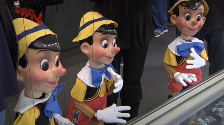 Three Pinocchio marionettes
