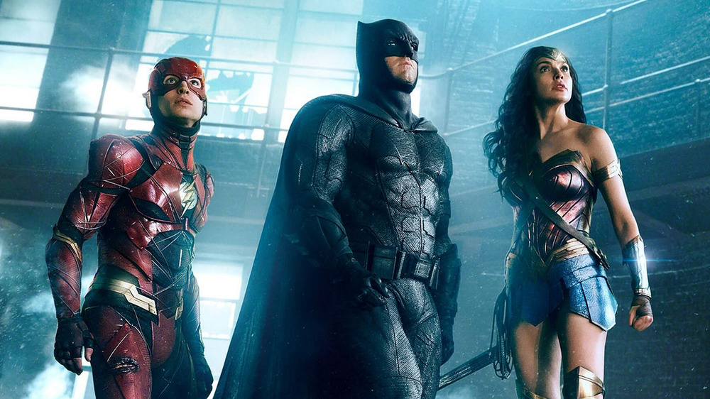 Gal Gadot, Ben Affleck, and Ezra Miller as Wonder Woman, Batman, and the Flash in Justice League