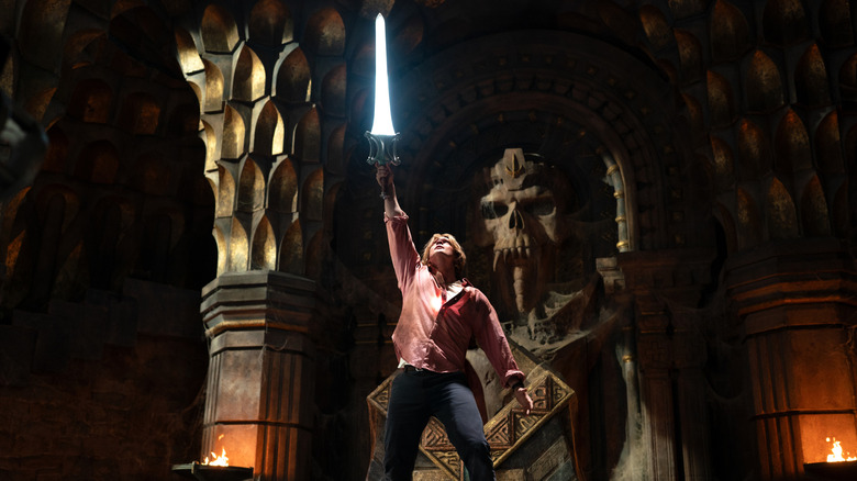 Prince Adam holds the Power Sword aloft in "Masters of the Universe" (2026)