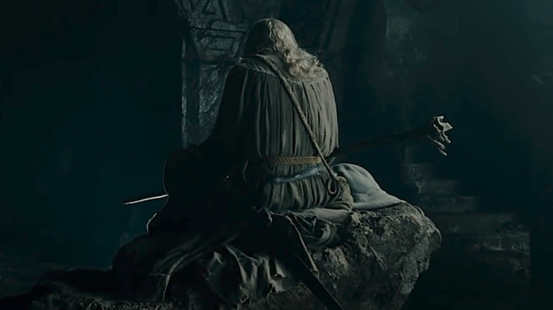 Gandalf sitting on a rock