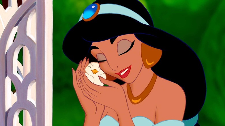 Jasmine holding a bird close