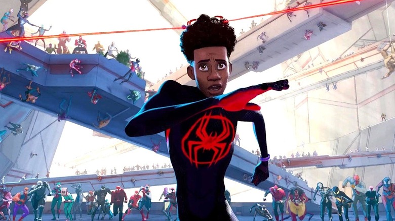 Miles Morales running from all the Spider-Man variants in Spider-Man: Across the Spider-Verse
