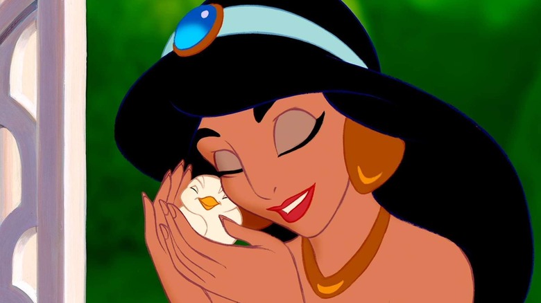 Jasmine holding a bird close