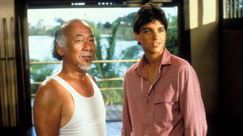 Pat Morita and Ralph Macchio in a scene from the film 