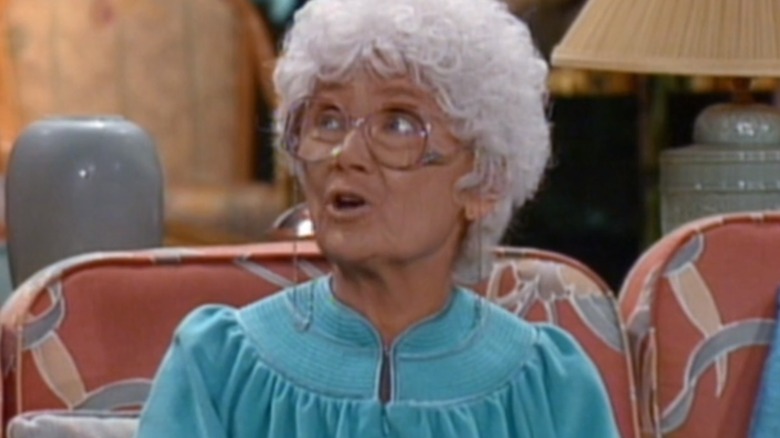 Sophia in a blue gown speaking in "The Golden Girls"