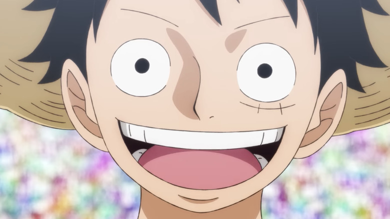 Luffy smiling at Uta's concert