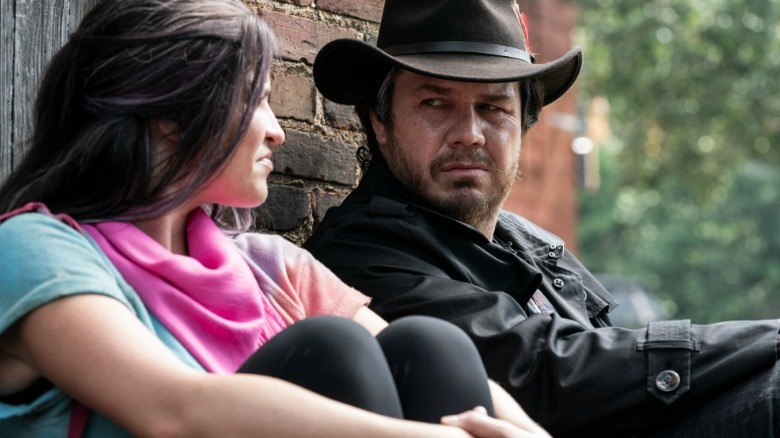 Eugene Porter and Princess sitting outside