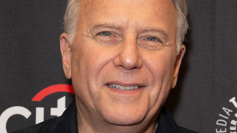 Paul Reiser smiling