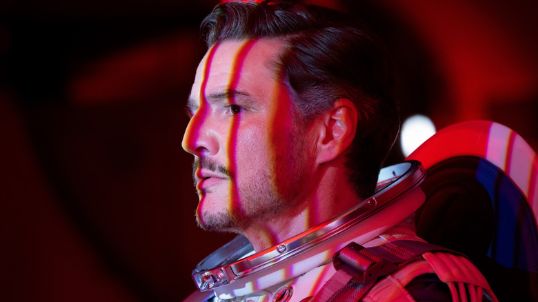 Reed Richards is bathed in red lighting in "The Fantastic Four: First Steps" (2025)