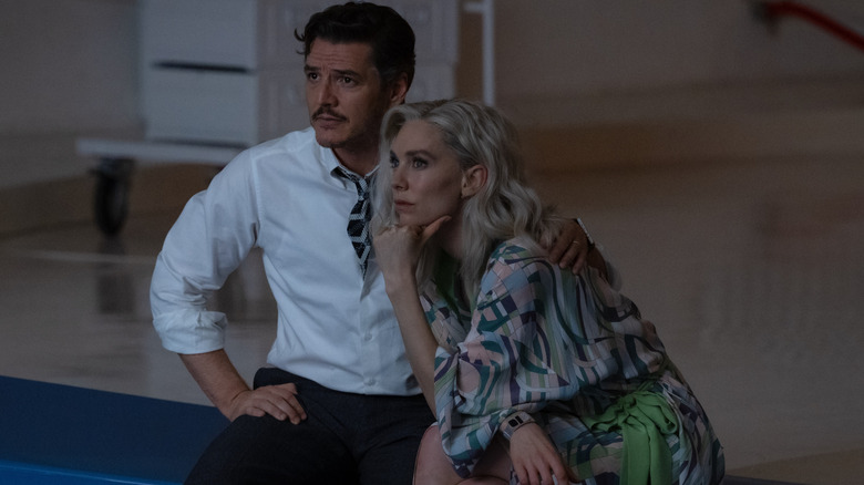Reed Richards holding Sue Storm in "The Fantastic Four: First Steps" (2025)
