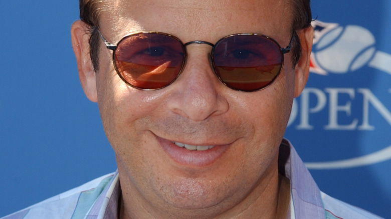 Rick Moranis poses