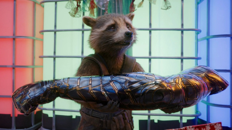 Rcoket holding Bucky's arm