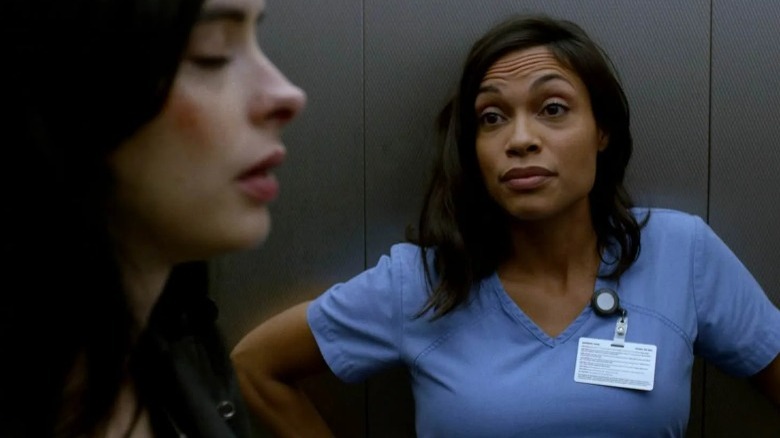 Claire Temple in an elevator with Jessica Jones