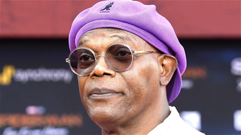 Samuel L. Jackson wearing a purple cap