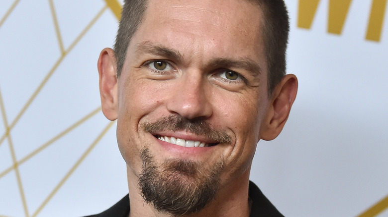 Steve Howey smiling