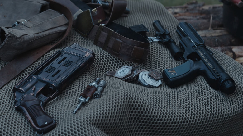 Star Wars blasters on blanket