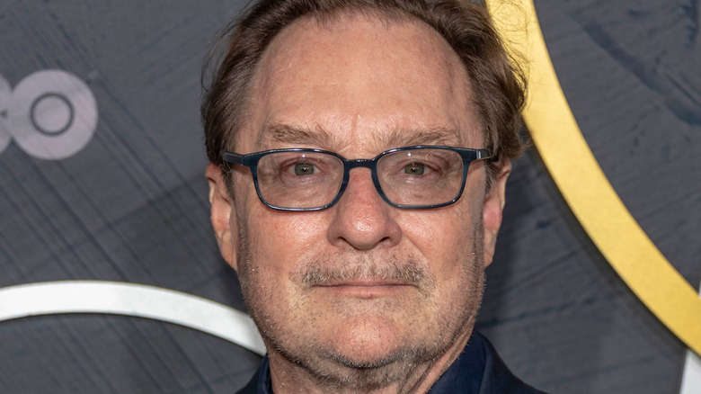 Stephen Root on red carpet in glasses