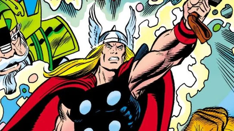 Thor lifting Mjolnir and looking angry in The Mighty Thor