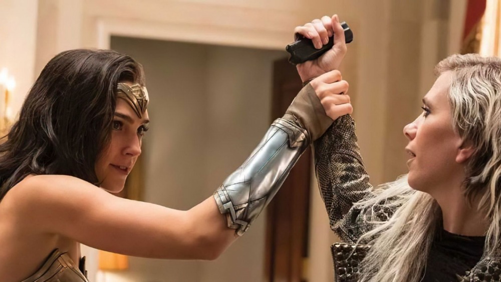 Wonder Woman grabbing Cheetah's arm