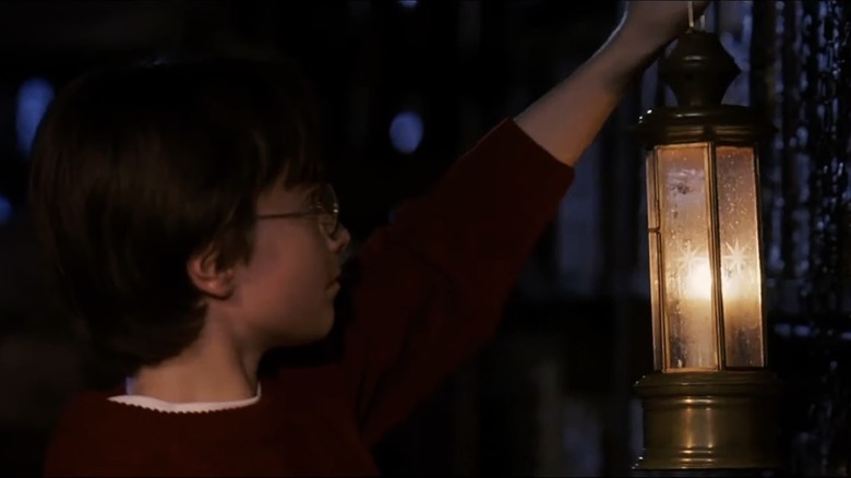 Harry Potter goes into the Restricted Section with a lantern