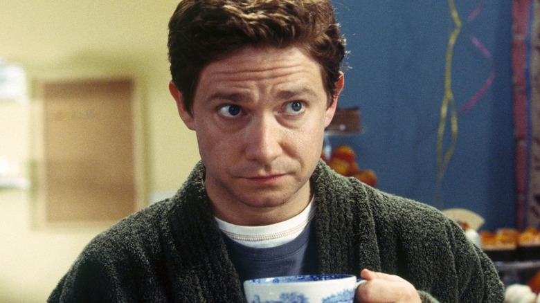Arthur Dent looks up from a cup
