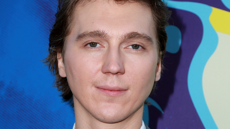 Paul Dano smiling on red carpet